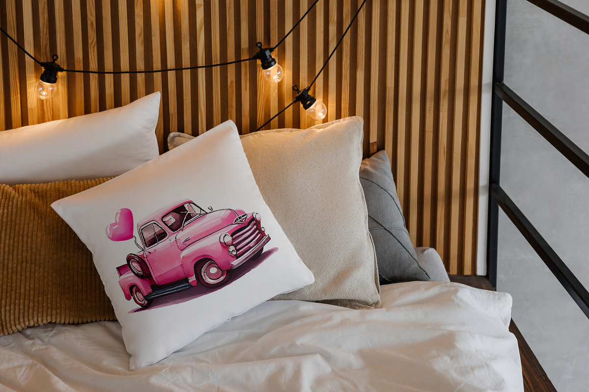 Vintage Pink Truck Cushion in a Cozy Bedroom Setting