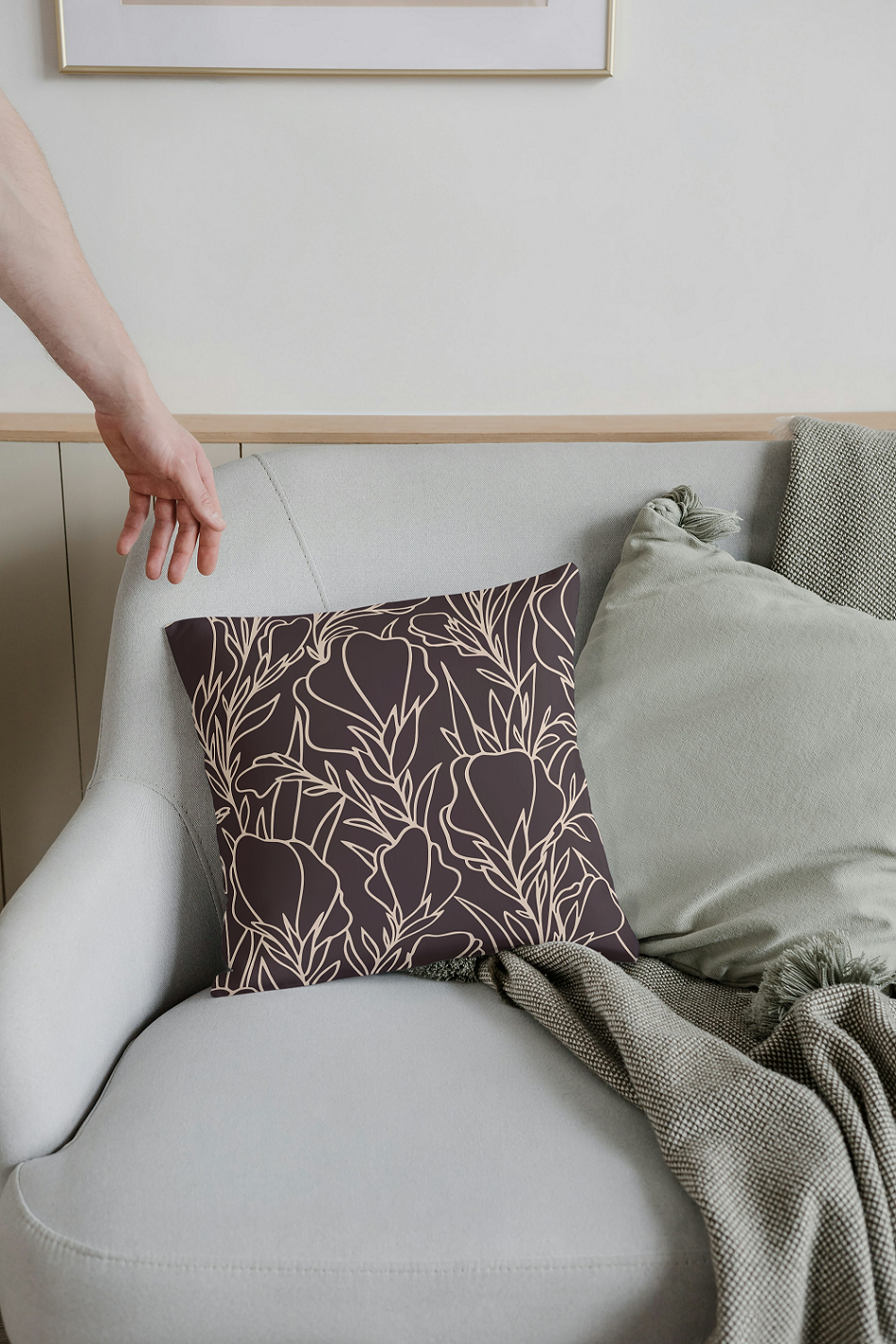 Elegant Minimalism: A Dark Floral Cushion for a Cozy Interior